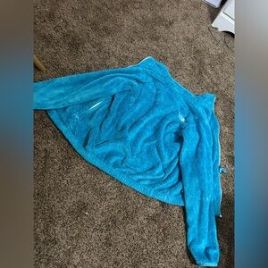 North Face jacket in blue. Size is large 14/16